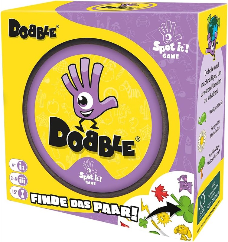 Dobble Karten mit Symbolen während einer schnellen Partie